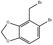 1,3-Benzodioxole, 5-bromo-4-(bromomethyl)-