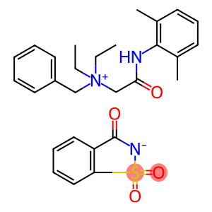 N-benzyl-2-[(2,6-dimethylphenyl)amino]-N,N-diethyl-2-oxoethanaminium 1,2-benzothiazol-3-olate 1,1-dioxide
